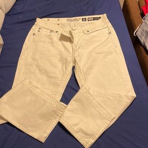 Miss me mid rise cuffed skinny jeans size 32 color white small yellow mark